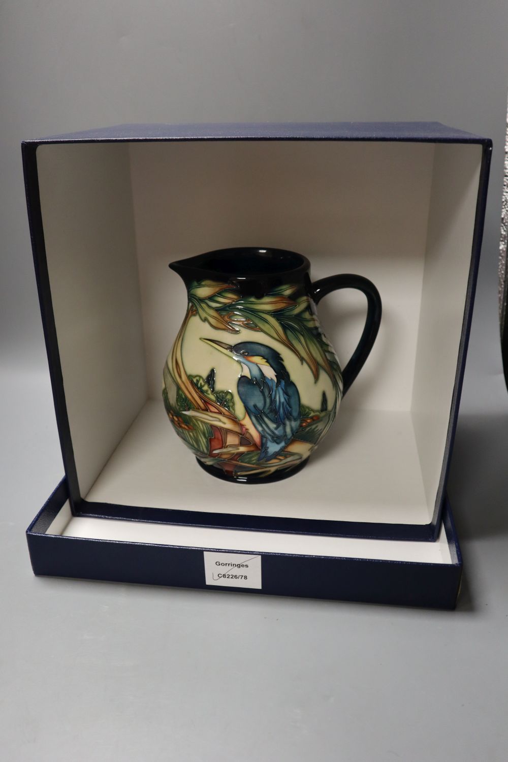 A Moorcroft jug, Kingfisher pattern, designed by Philip Gibson, Gibson, limited edition number 35 of 350, 19cms, together with orig